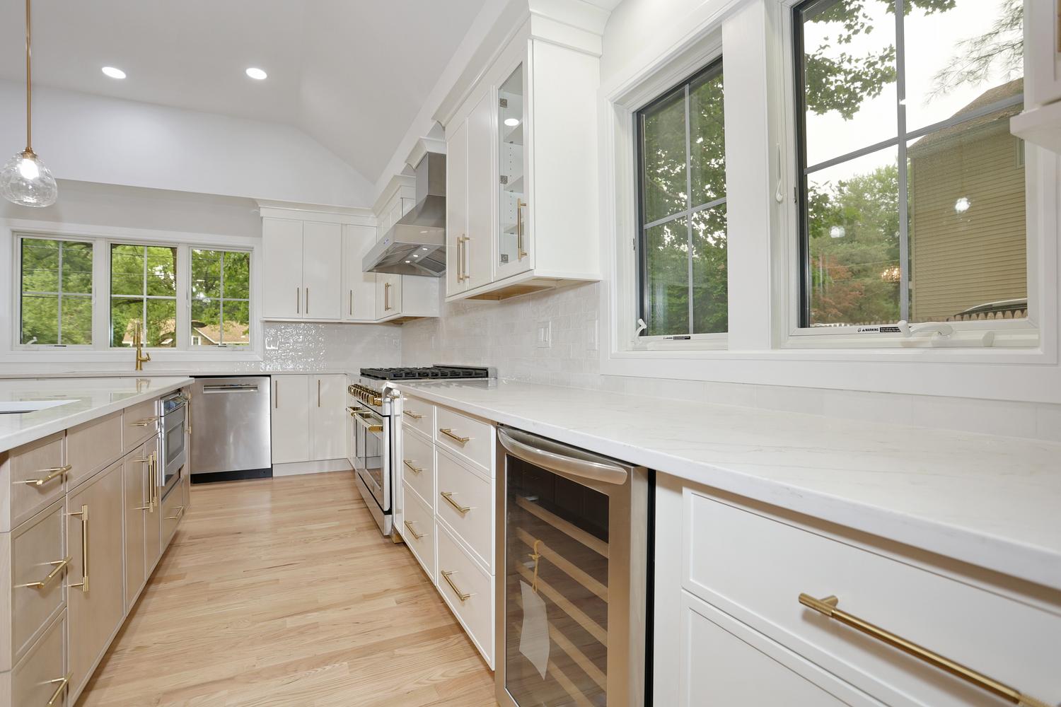 Hillsdale NJ custom home — Kitchen — White Cabinets & Gold Fixtures — Dadak LLC