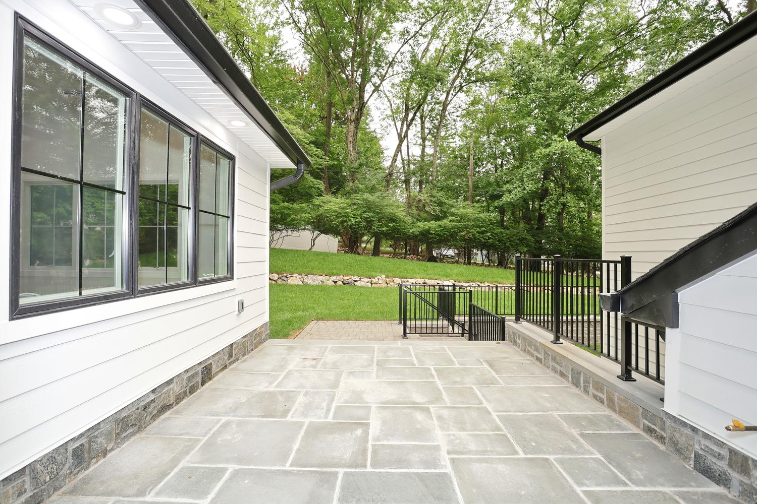 Hillsdale NJ custom home — Patio — Stone Detail — Dadak LLC