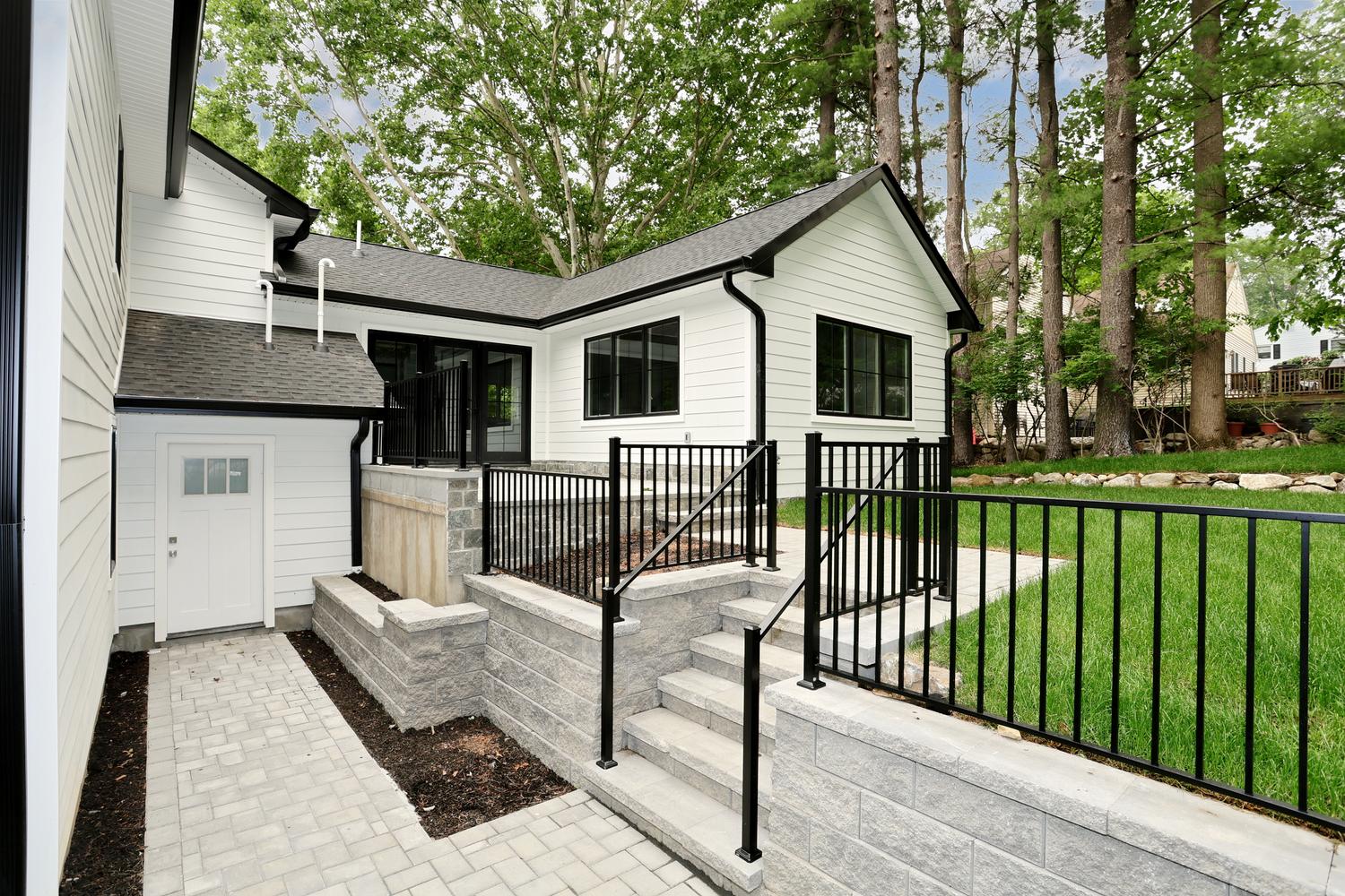 Hillsdale NJ custom home — Rear Paver Patio — Dadak LLC