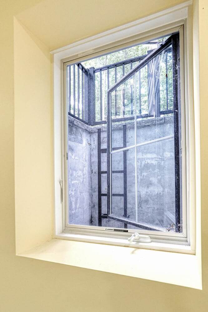 Montvale basement — Basement Egress Window View — Dadak LLC