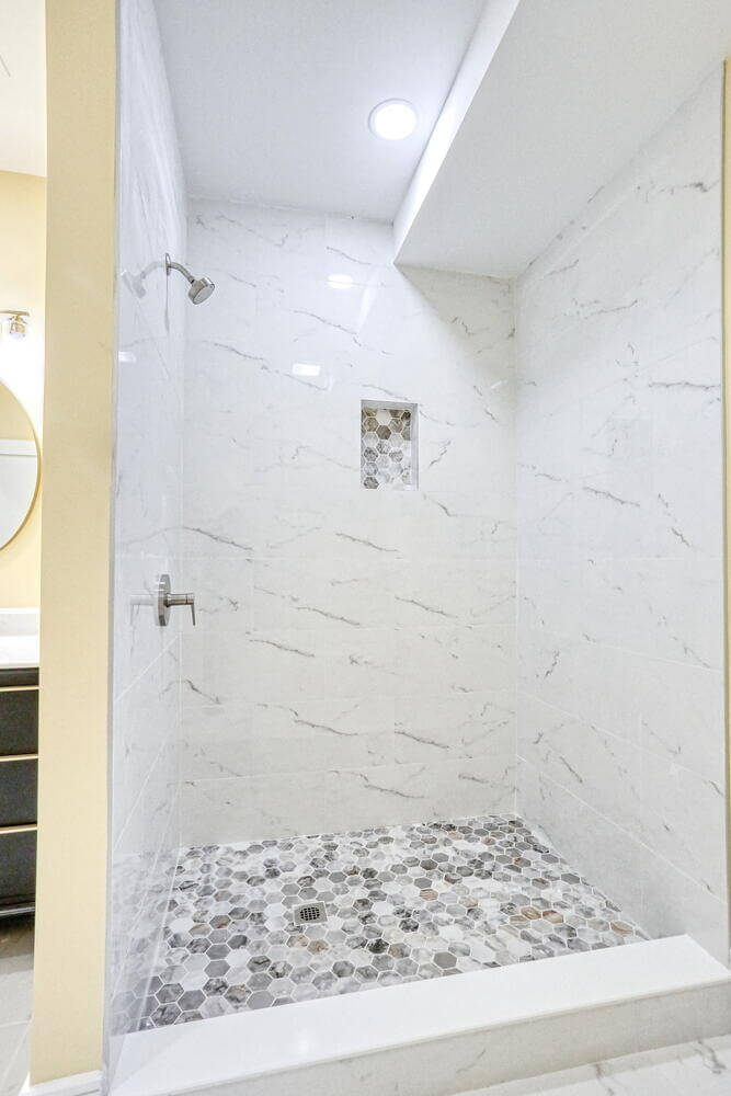 Montvale basement — Basement Shower Marble Hex Tile — Dadak LLC