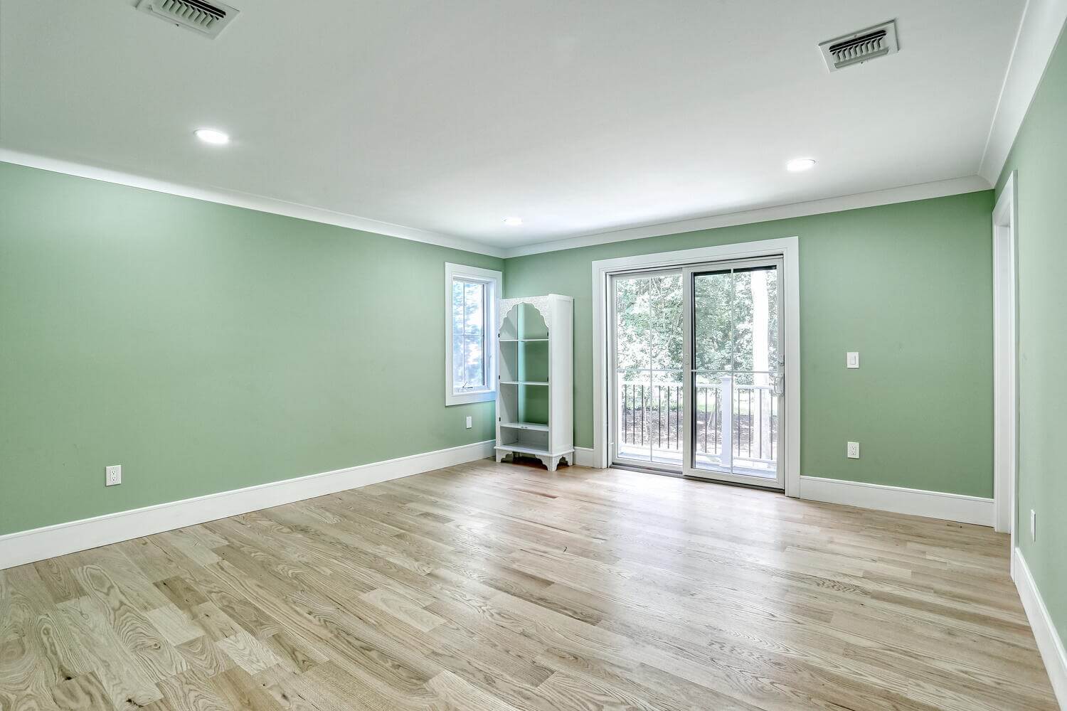 Montvale bedroom — Bedroom With White Trim And Recessed Lights — Dadak LLC