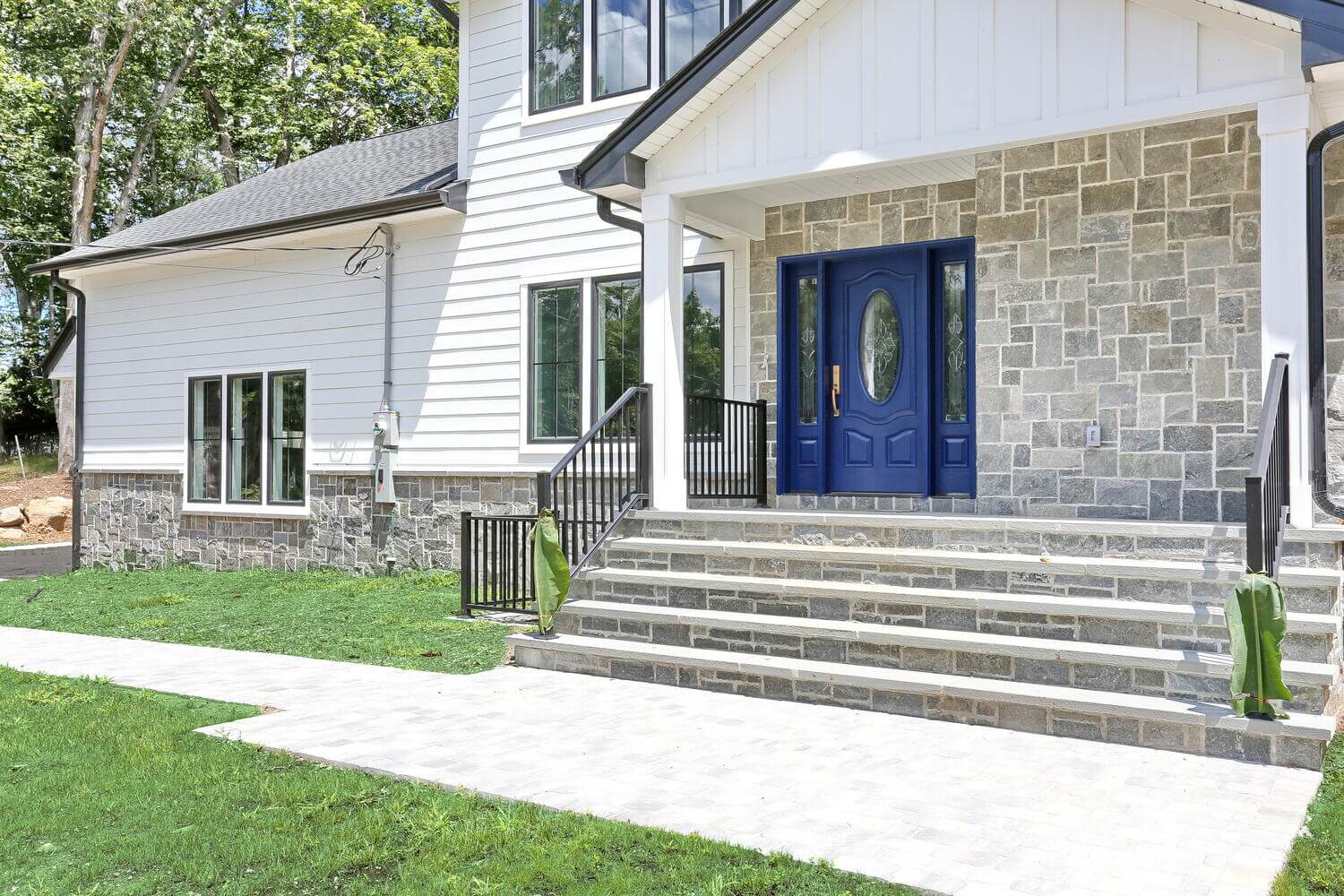 Montvale exterior — Custom Home Front Entry Blue Door — Dadak LLC