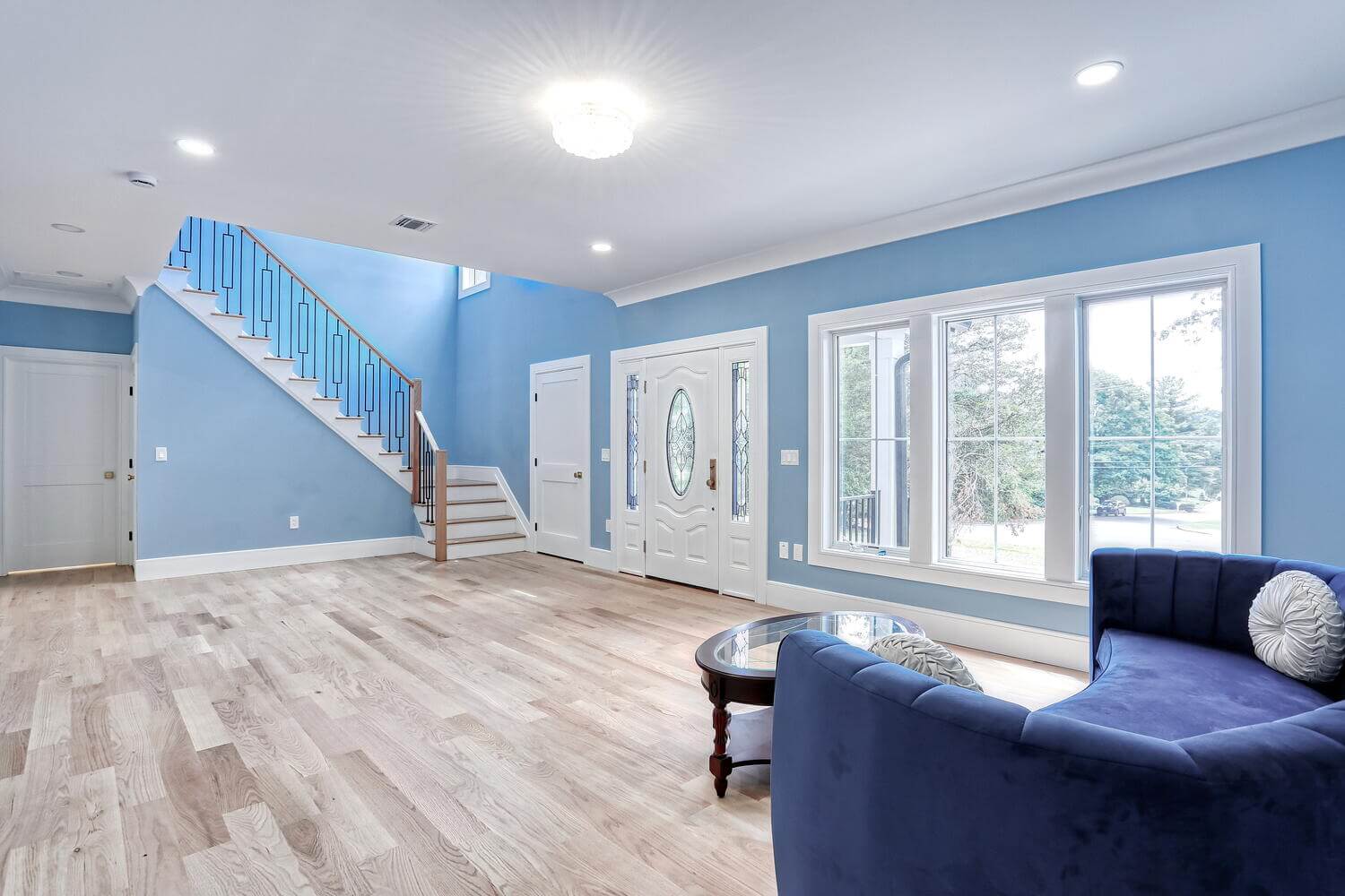 Montvale living space — Living Room Stairs Open Layout — Dadak LLC