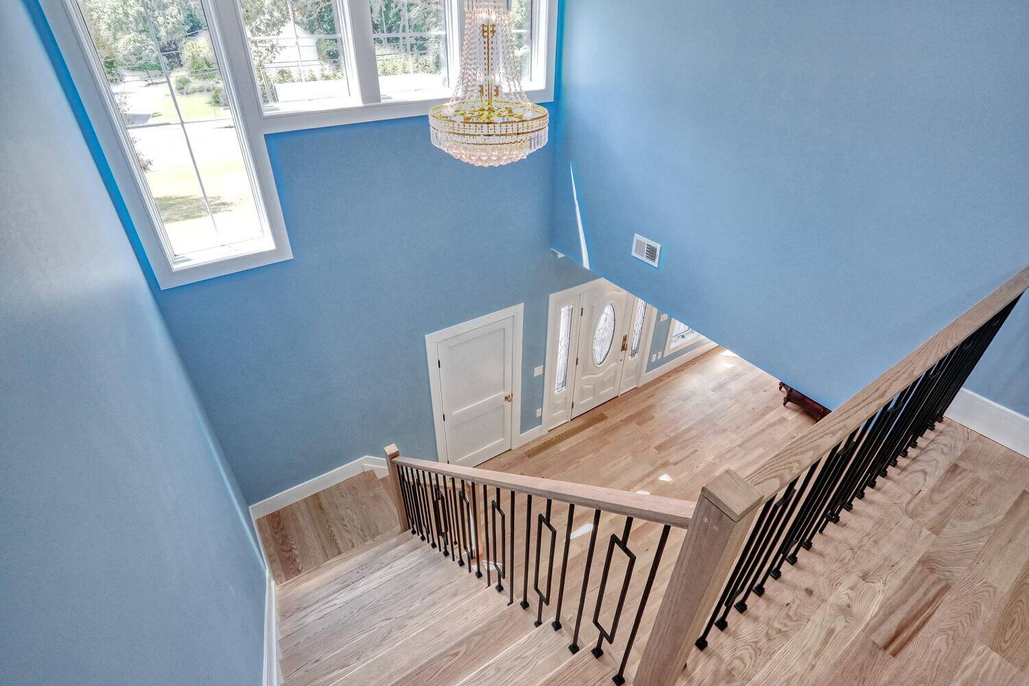 Montvale entryway & stairs — Staircase Landing Overlook — Dadak LLC