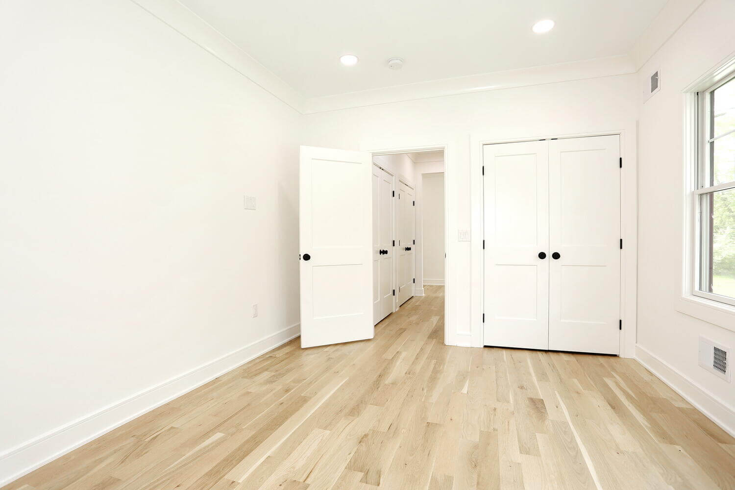 Park Ridge entryway & stairs — Bedroom Four Hallway View — Dadak LLC