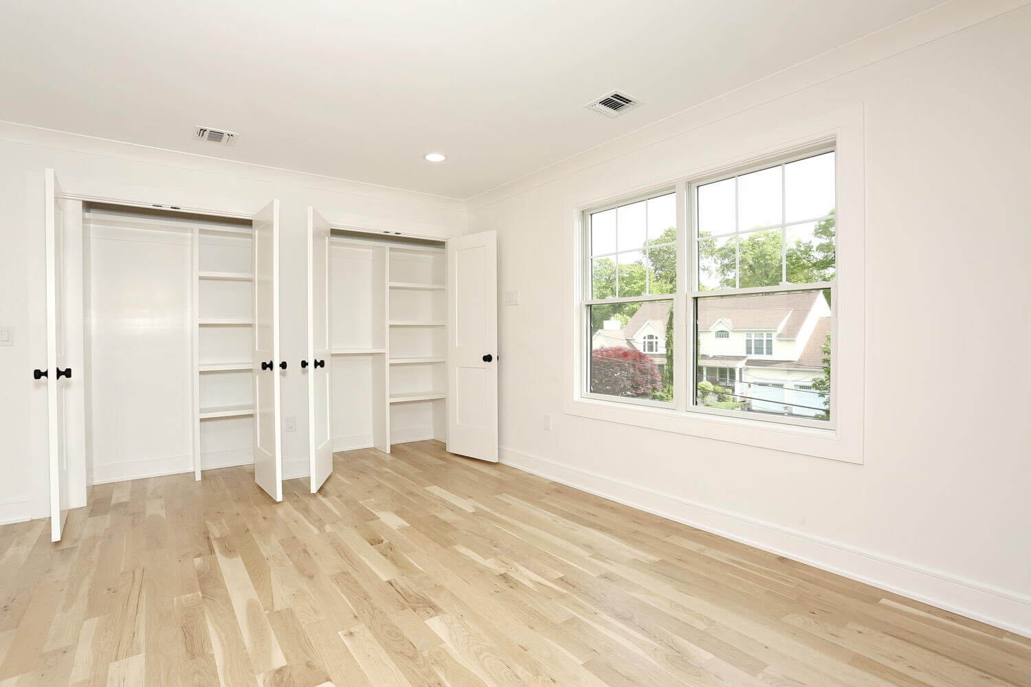Park Ridge bedroom — Bedroom Three Built In Closet Shelves — Dadak LLC