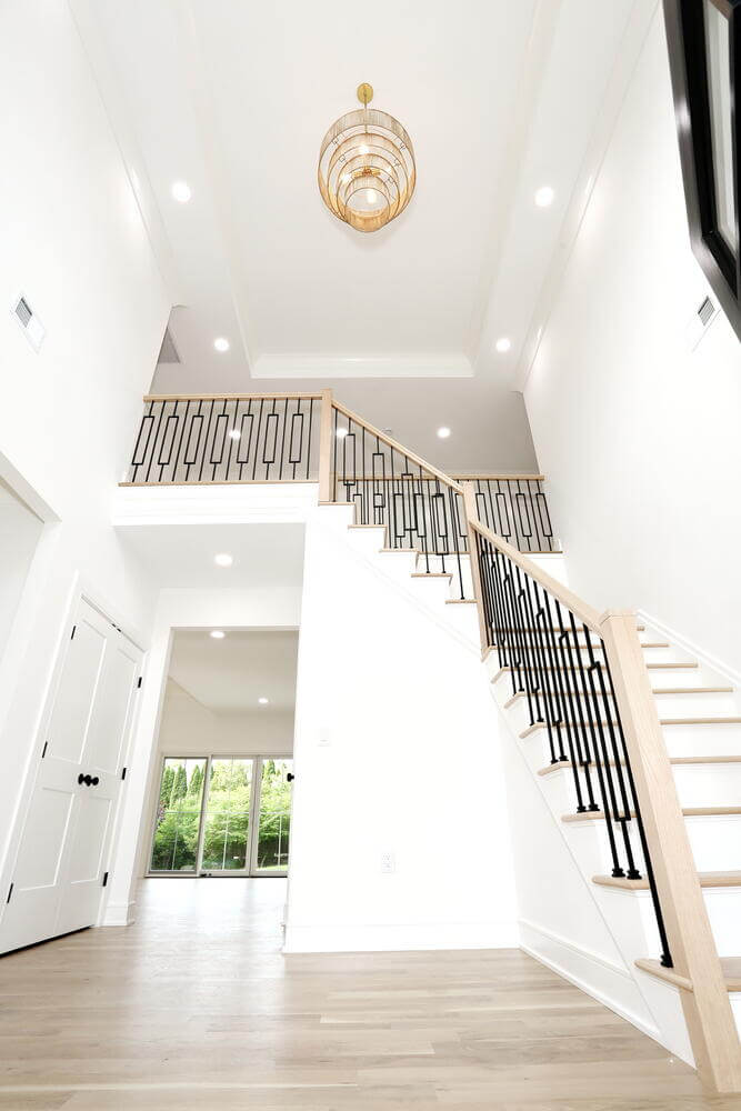 Park Ridge entryway & stairs — Foyer Chandelier — Dadak LLC