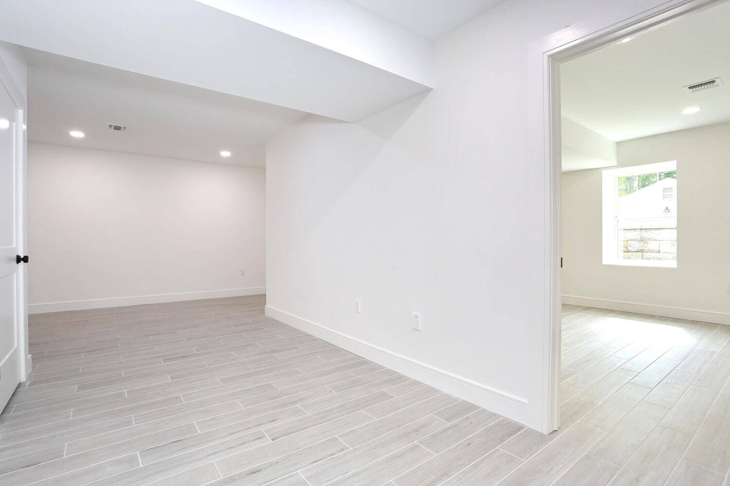 Park Ridge basement — Lower Level Bedroom Five Hallway View — Dadak LLC