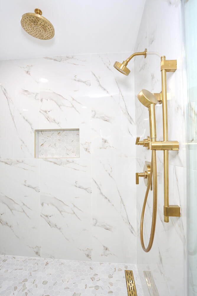 Park Ridge primary suite — Primary Bathroom Shower Gold Fixtures — Dadak LLC