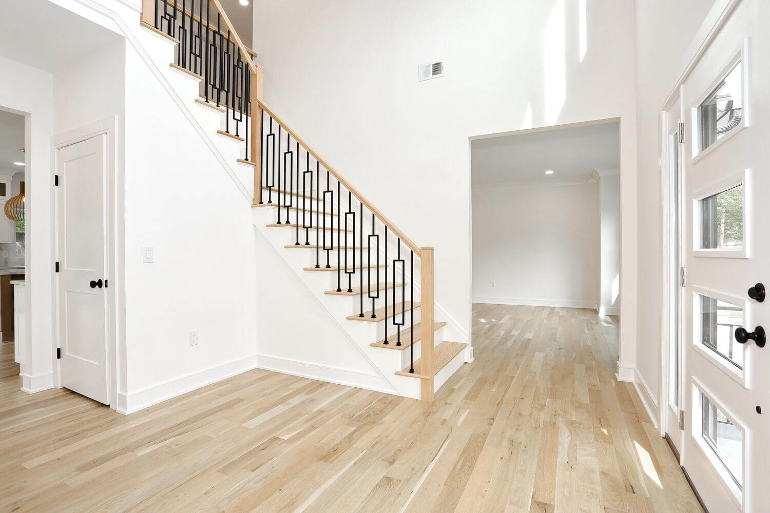 Park Ridge entryway & stairs — Staircase Entryway View — Dadak LLC