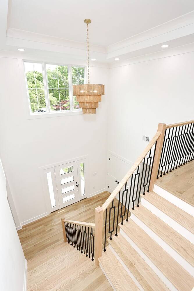Park Ridge entryway & stairs — Staircase Foyer Chandelier — Dadak LLC