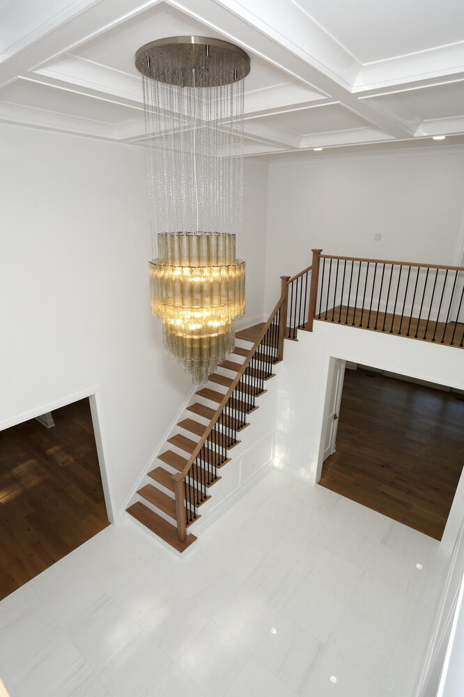River Vale entryway & stairs — Foyer Chandelier Detail — Dadak LLC