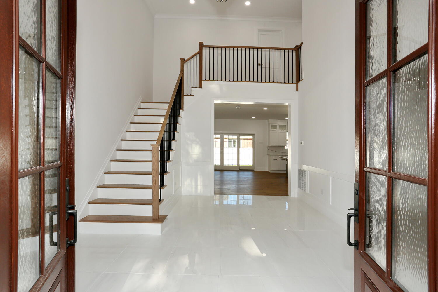 River Vale entryway & stairs — Foyer Open Staircase — Dadak LLC
