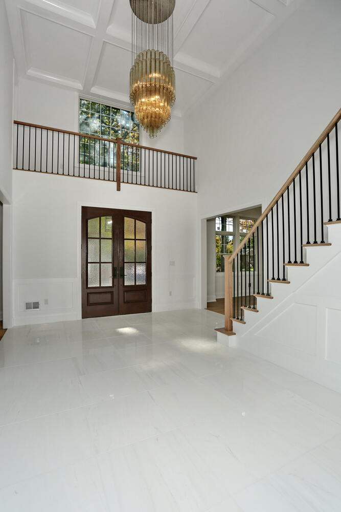River Vale entryway & stairs — Foyer Staircase Detail — Dadak LLC