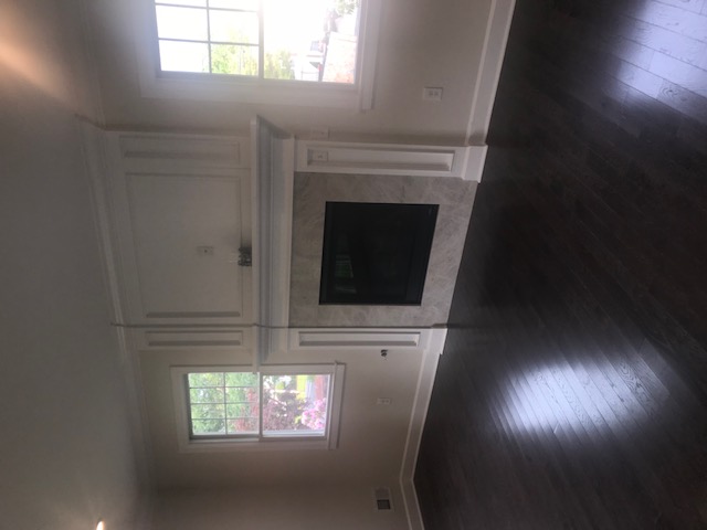 Westwood — Living Room Fireplace with Marble Surround — Dadak LLC