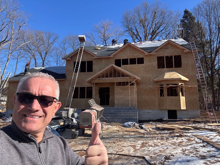 Dragan Dinic, Co-Founder and Construction Lead of Dadak LLC, on a Bergen County NJ job site with custom home under construction